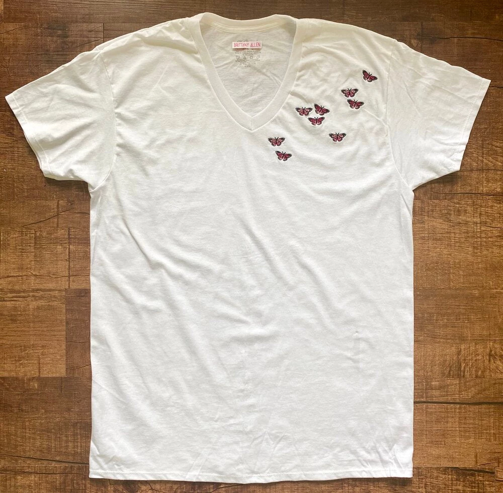 Shop Brittany Allen Pink Butterfly Swarm Tee TEES 1 Shop Brittany Allen Pink Butterfly Swarm Tee TEES